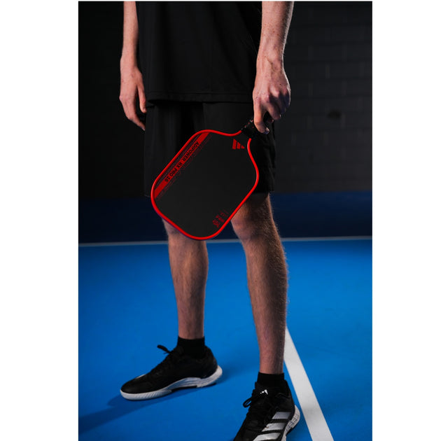 Adidas CJ Klinger Adipower Pro EDT Pickleball Paddle - padel held by man