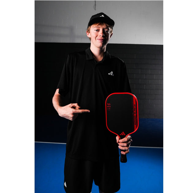 Adidas CJ Klinger Adipower Pro EDT Pickleball Paddle - CJ Klinger holding racket