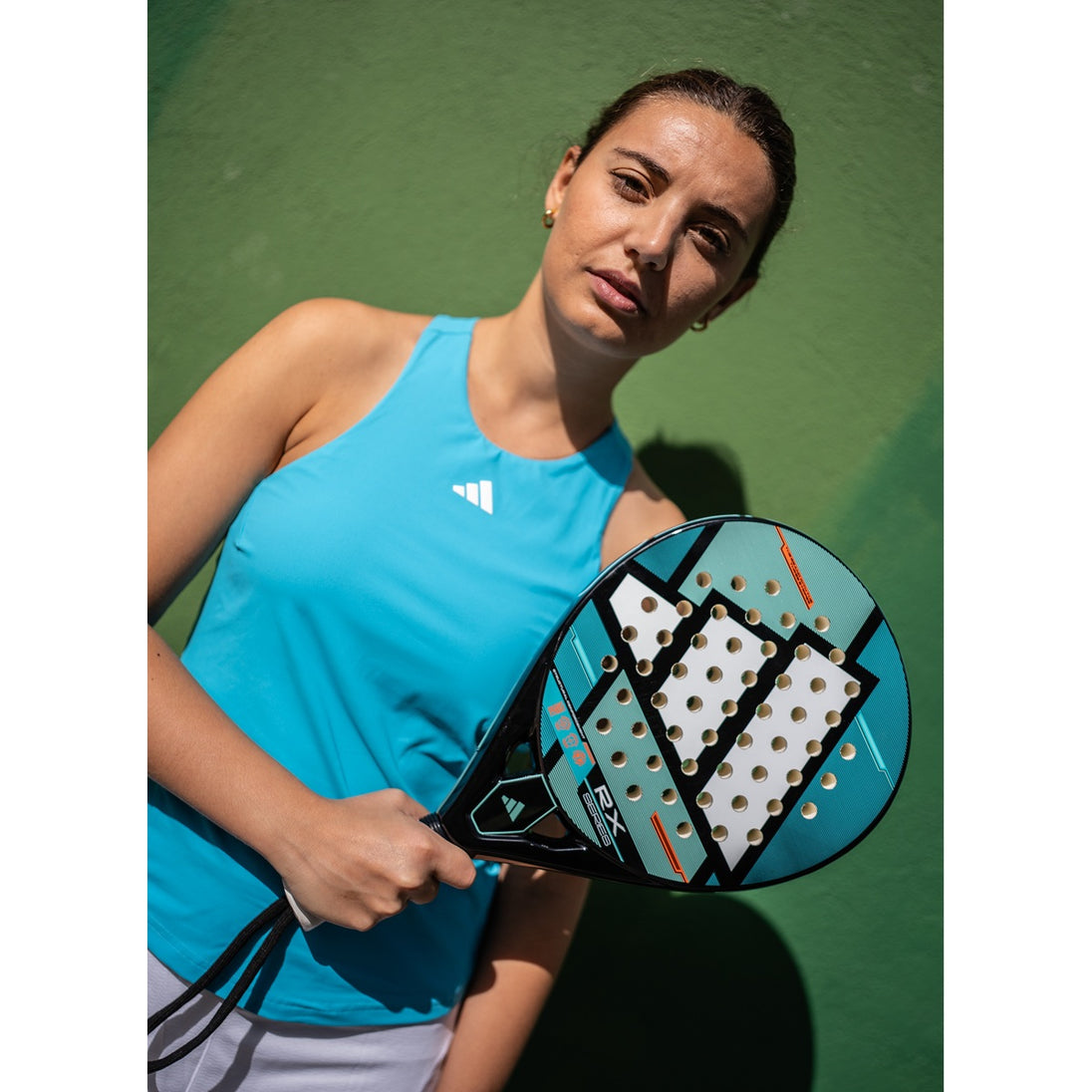 Adidas RX Series Padel Racket - woman hold racket showing face view