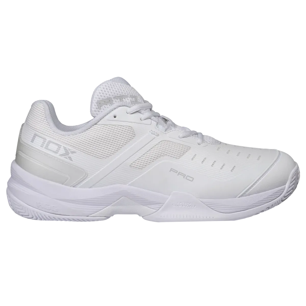 A white Nox Pro tennis shoe shown from a side profile view against a plain white background.