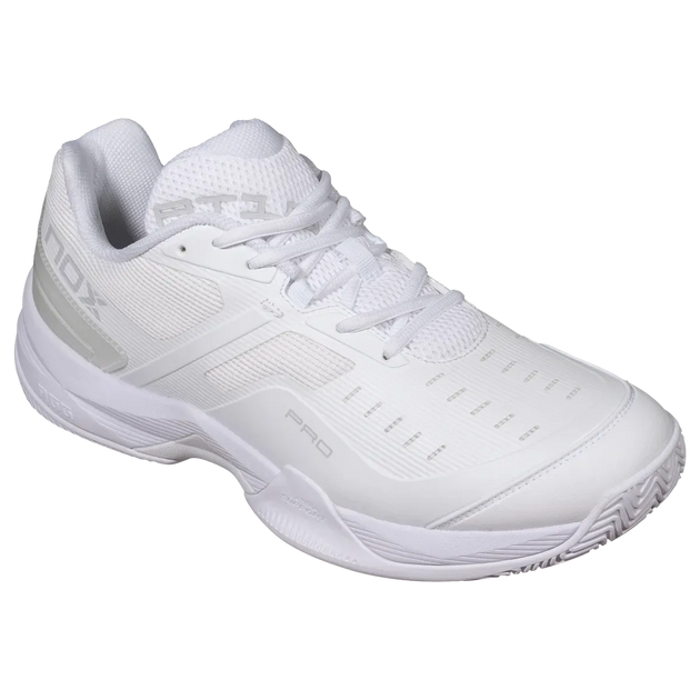A white athletic shoe with gray accents, featuring a textured synthetic and mesh upper, white laces, and a thick white sole, shown against a plain white background.