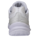 White athletic shoe shown from the rear three-quarter view, featuring a thick white sole with textured wavy tread, a padded collar, and a translucent white heel overlay with gray branding.