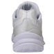 White athletic shoe shown from the rear three-quarter view, featuring a thick white sole with textured wavy tread, a padded collar, and a translucent white heel overlay with gray branding.