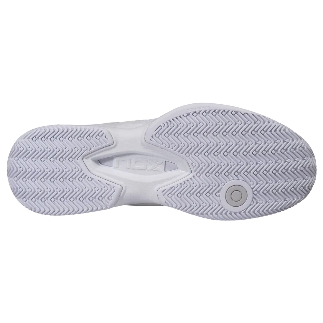 The outsole of a white athletic shoe, showing the textured tread pattern.