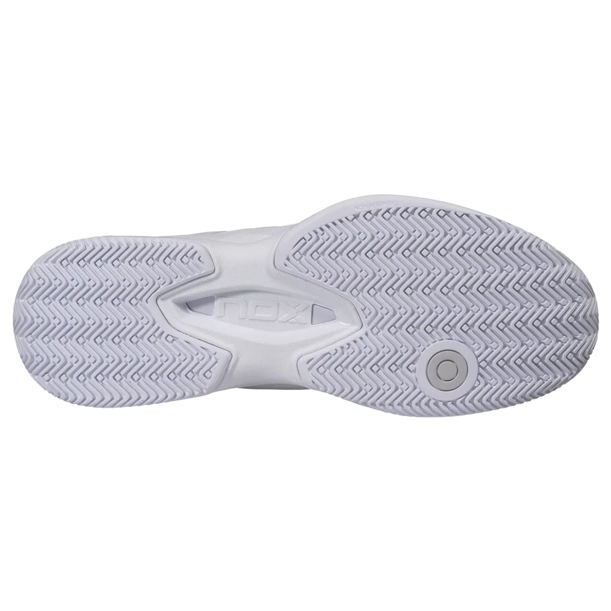 The outsole of a white athletic shoe, showing the textured tread pattern.