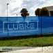 Putterman KnitGard Windscreens (85-90% Opacity) - blue on fencing